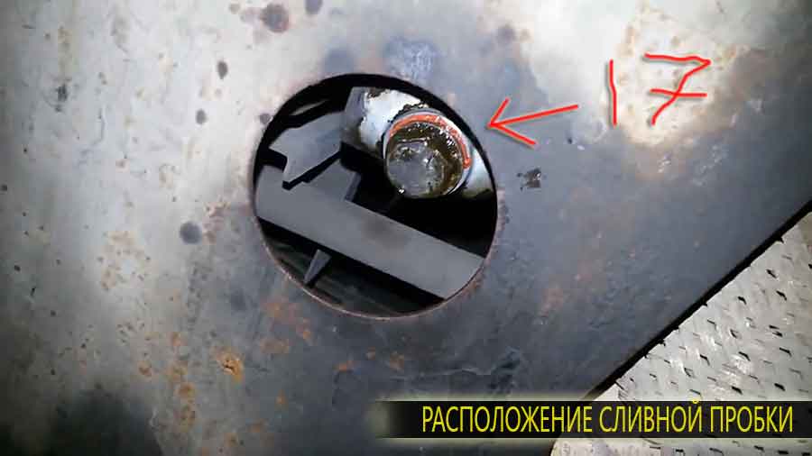 Расположение сливной пробки на Авео. Откручивается торцовой головкой на 17